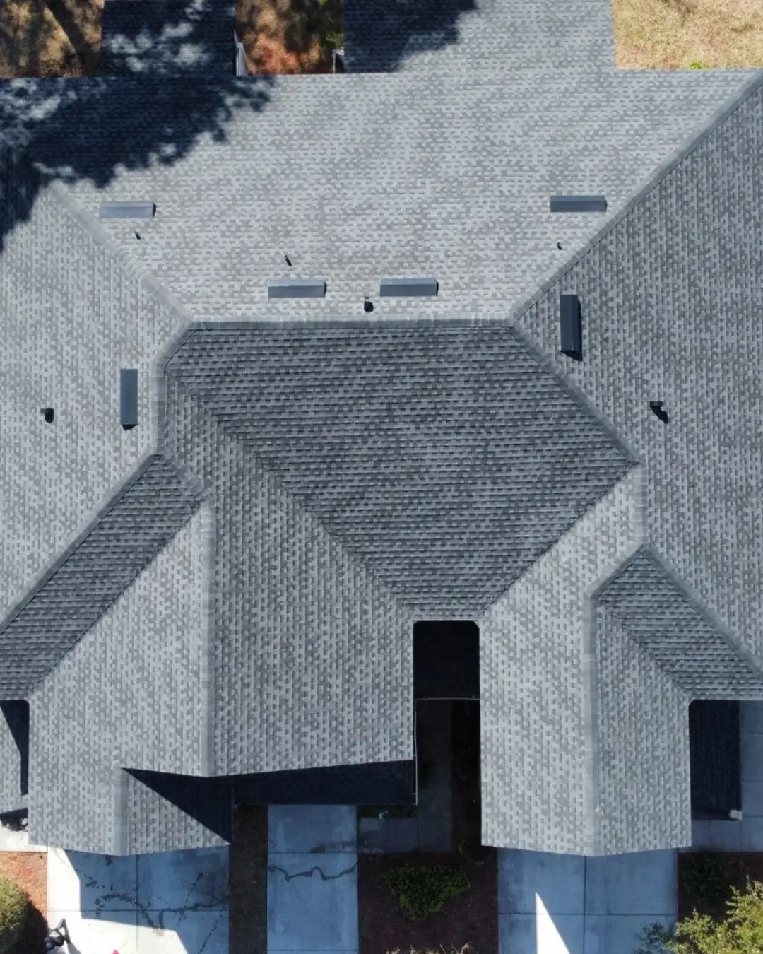 an aerial photo of a completed roof